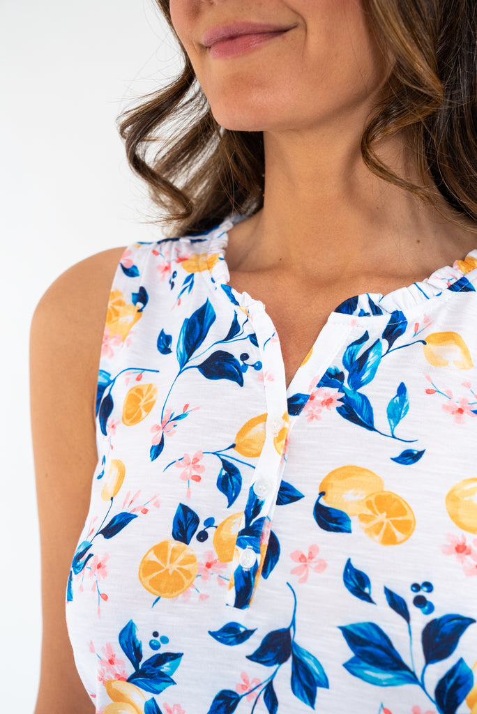 sleeveless lemon patterned top with buttons